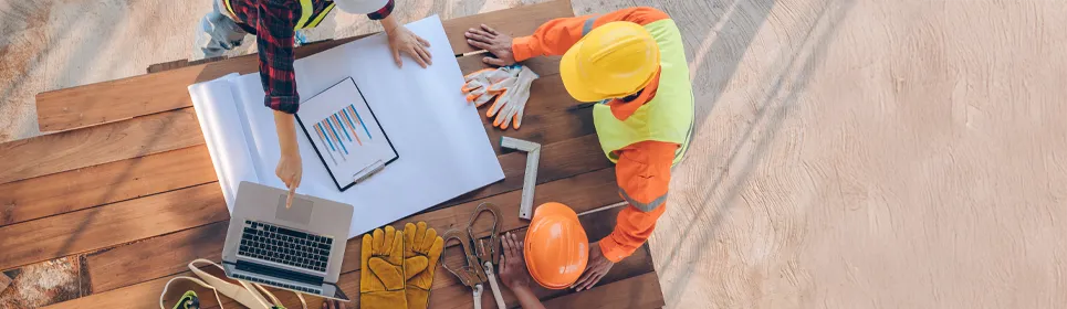 workers-using-construction-safety-software-on-a-jobsite